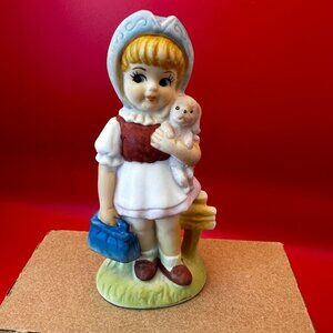 VTG CERAMIC FIGURINE LITTLE GIRL HOLDING PUPPY & BLUE PURSE, 4.5 in